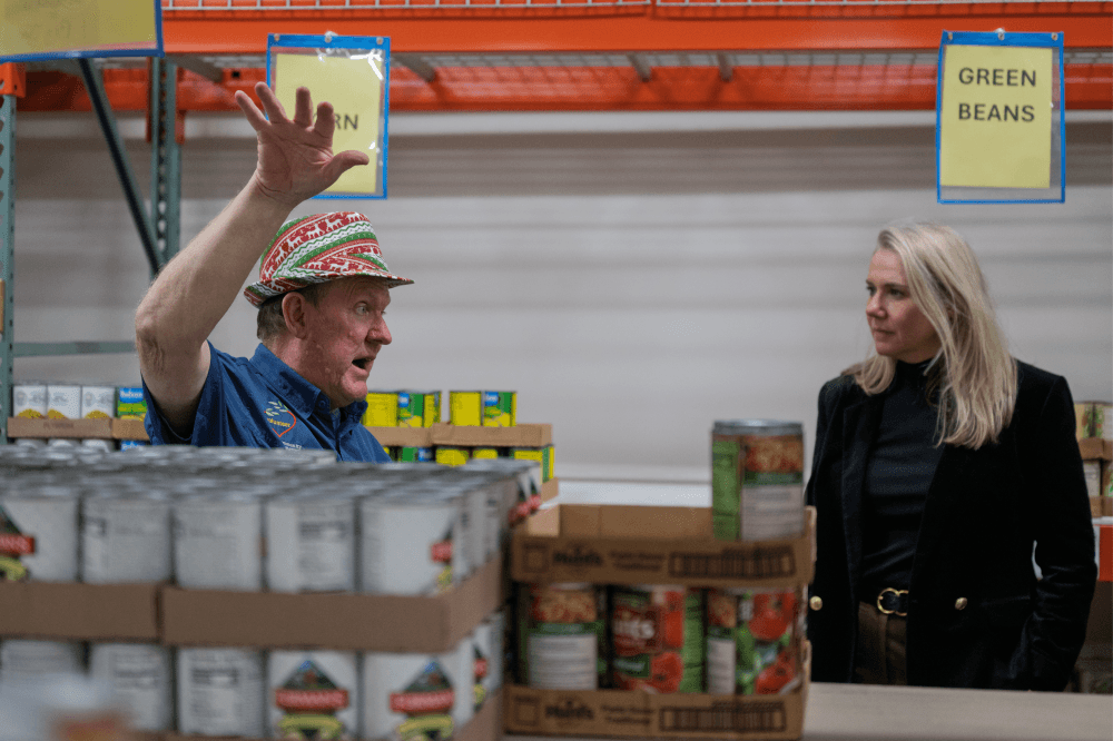 Volunteers distribute nutritious food to local families at the Denton Community Food Center in Denton, Texas, made possible through a $5,000 corporate donation from Hillwood and Landmark by Hillwood.