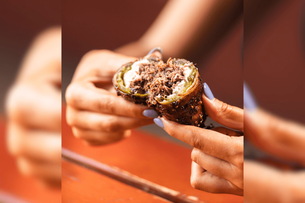 Person holding BBQ wrap