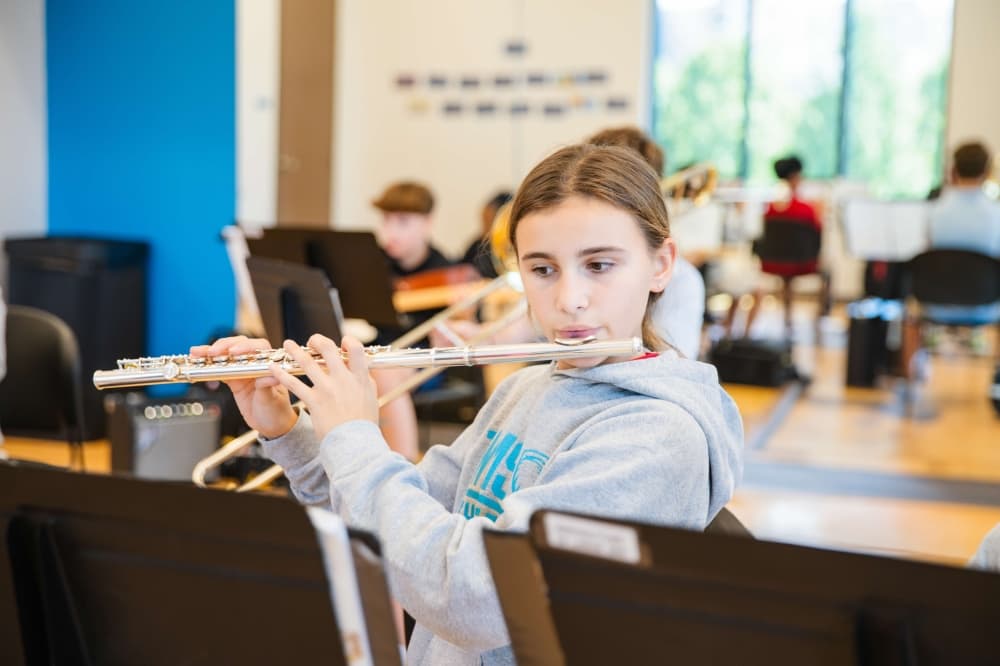 girl playing a flute
