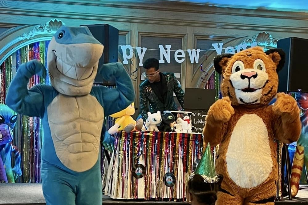 costumed animal characters at a celebration
