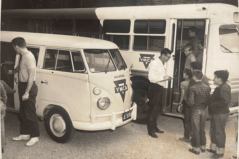 Old photos of kids lining up for the YMCA bus