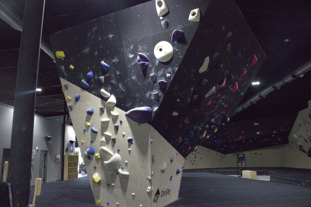 With around 6,000 square feet of climbing wall space, MoCo Bouldering and Fitness offers multiple walls and courses designed to challenge climbers at every level of experience. (Cole Gee/Community Impact)