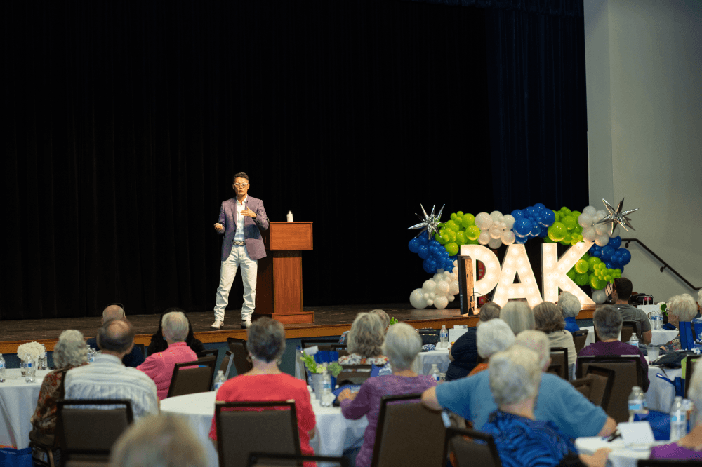 Dr. Pak giving a speech