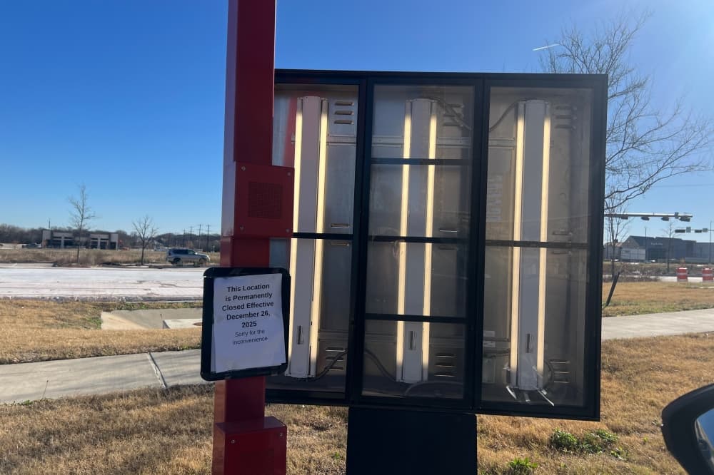 A sign is posted notifying customers of the Scooter's Coffee closure at 8650 W. University Drive in McKinney.