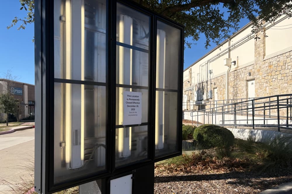 A sign is posted notifying customers of the Scooter's Coffee closure at 2741 Virginia Parkway in McKinney.