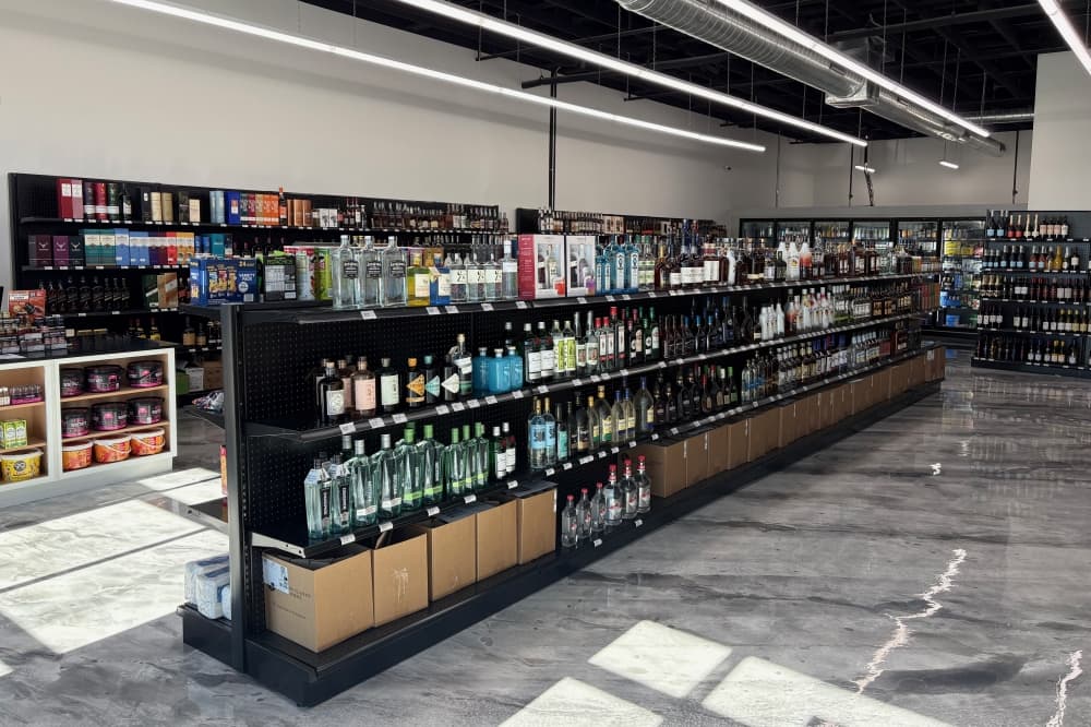 Image of Champions Liquor interior with shelves stocked with liquor