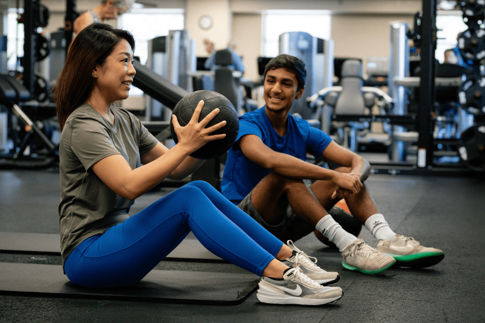 Members exercising together at a YMCA of Greater Houston location as part of community-focused wellness and New Year fitness programs in Houston