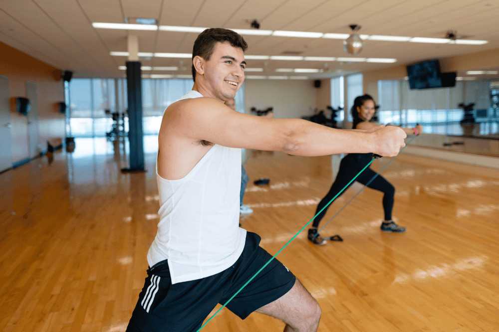 Group fitness class at YMCA of Greater Houston helping Houstonians turn New Year health and fitness goals into lasting habits through community support