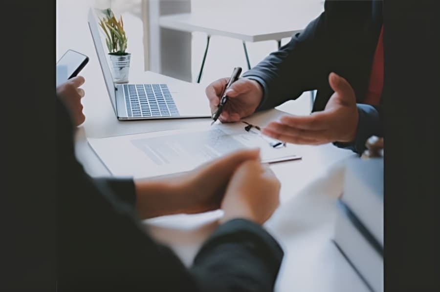 Lawyer consulting with client