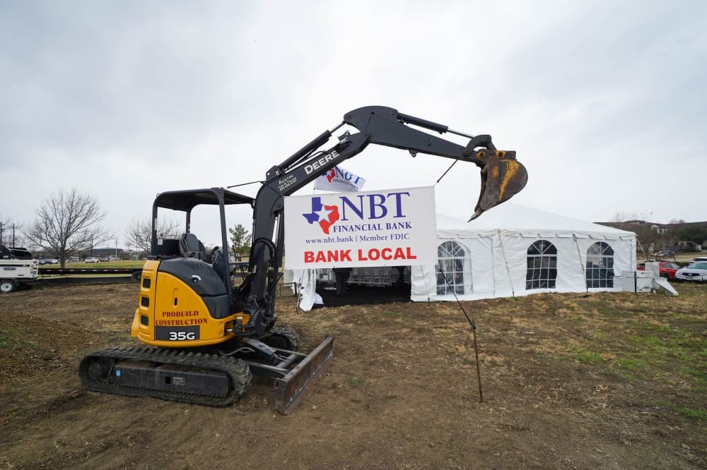 Crane in front of NBT Financial Bank sign