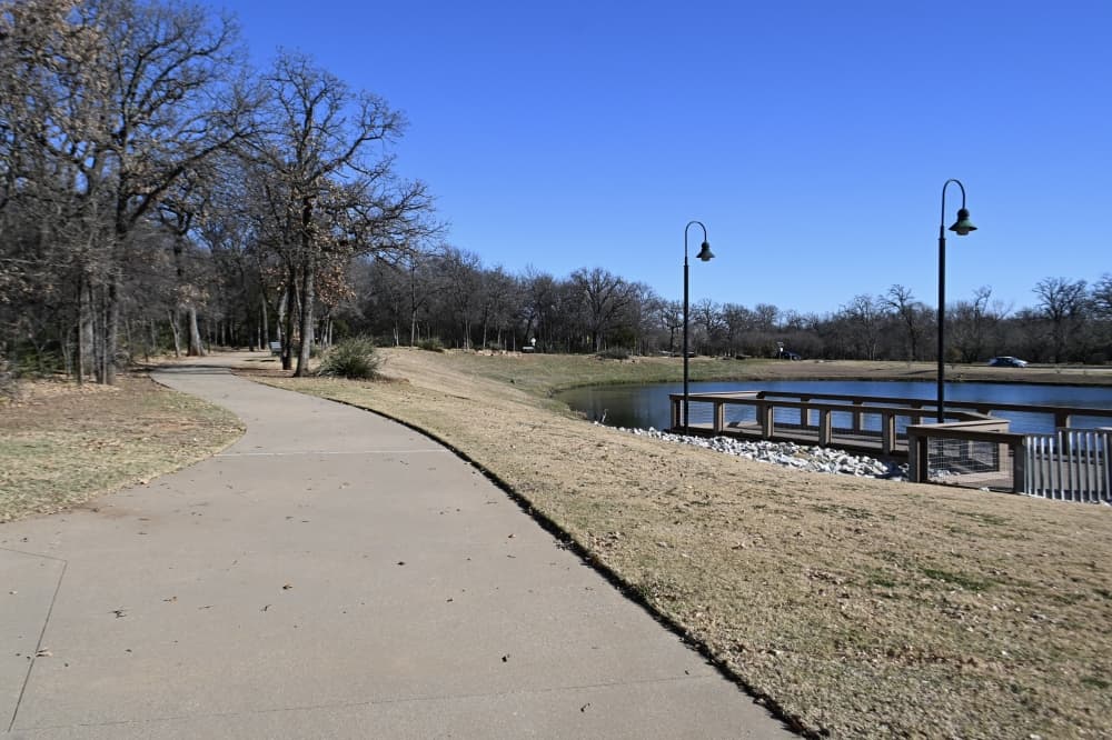 Village Park in Highland Village includes nearly 2 miles of paved trails, which provide nearby access to a fishing pond and playground.