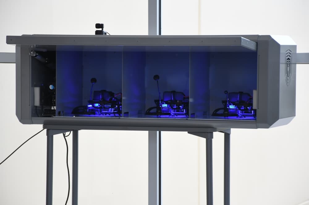 Drones stored in boxes