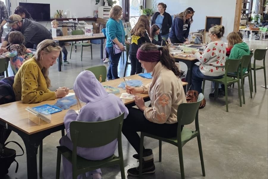 Participants at WheelCraft Studio's grand opening