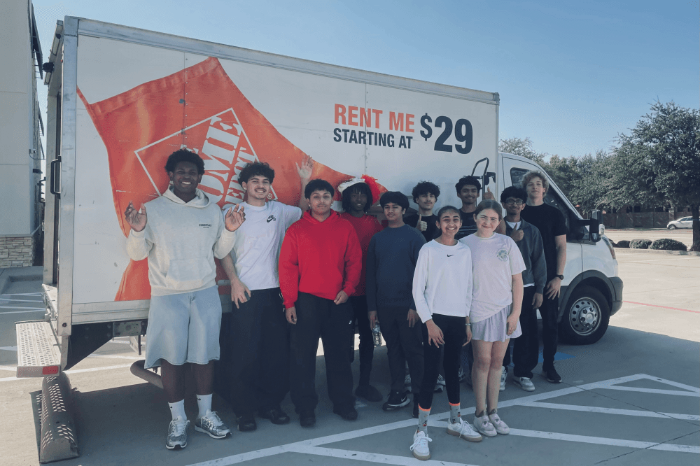 Students next to the U-Haul they filled with donation to a Frisco food pantry