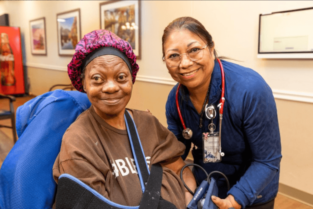 Therapist smiling with patient
