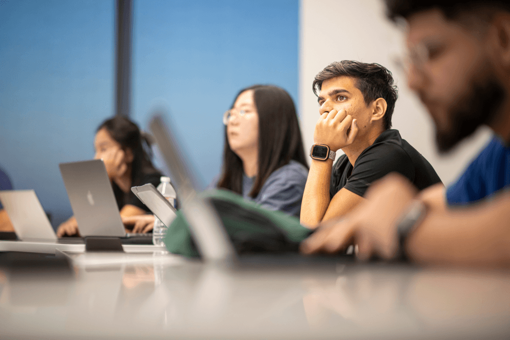 Students with laptops in lecture