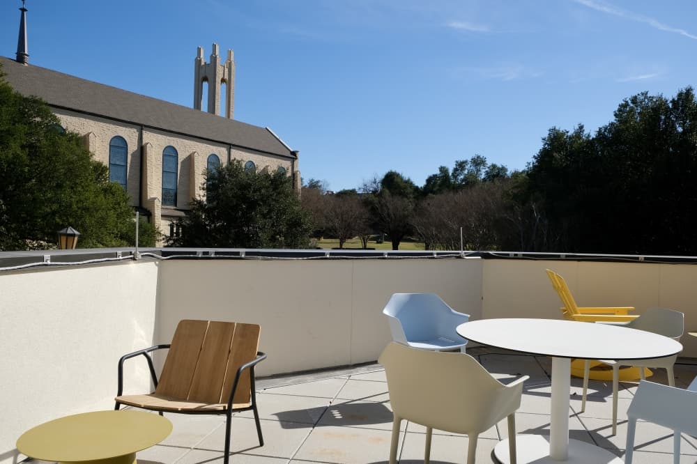 Ella Sedwick Hall features an outdoor lounge space. (Gracie Warhurst/Community Impact)