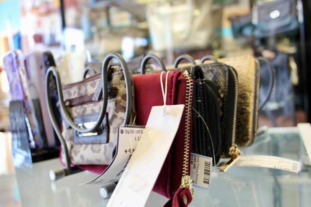 Retail Therapy offers designer hand bags and wallets. (Jovanna Aguilar/Community Impact)