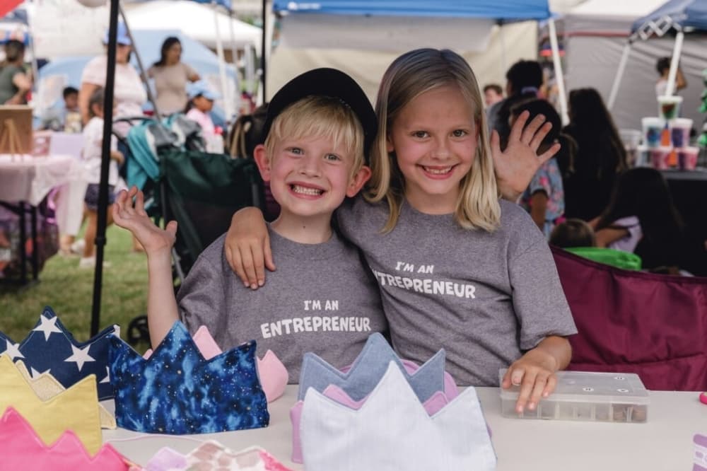 kids hugging at event