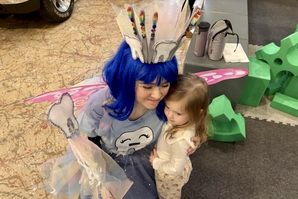 Tooth Fairy with child