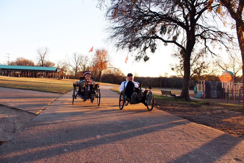 Richardson residents Rebecca Montgomery and Art Fischman enjoy a trail at Breckinridge Park. (Karen Chaney/Community Impact)