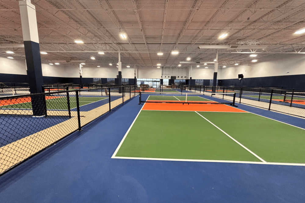 PPR-certified pickleball coaches leading group and private lessons for kids, couples, and competitive players at Dill Dinkers Plano, helping improve skills, strategy, and teamwork in a safe and fun indoor environment.