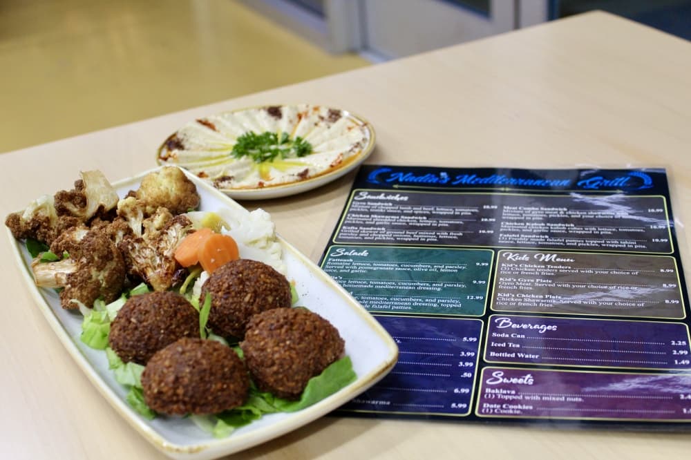 From the appetizer menu, customers can order fried cauliflower ($6.99) and falafel ($6.99). (Jovanna Aguilar/Community Impact)