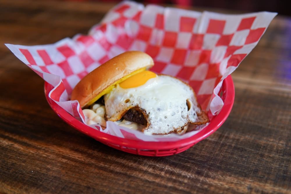 hamburger topped with an egg