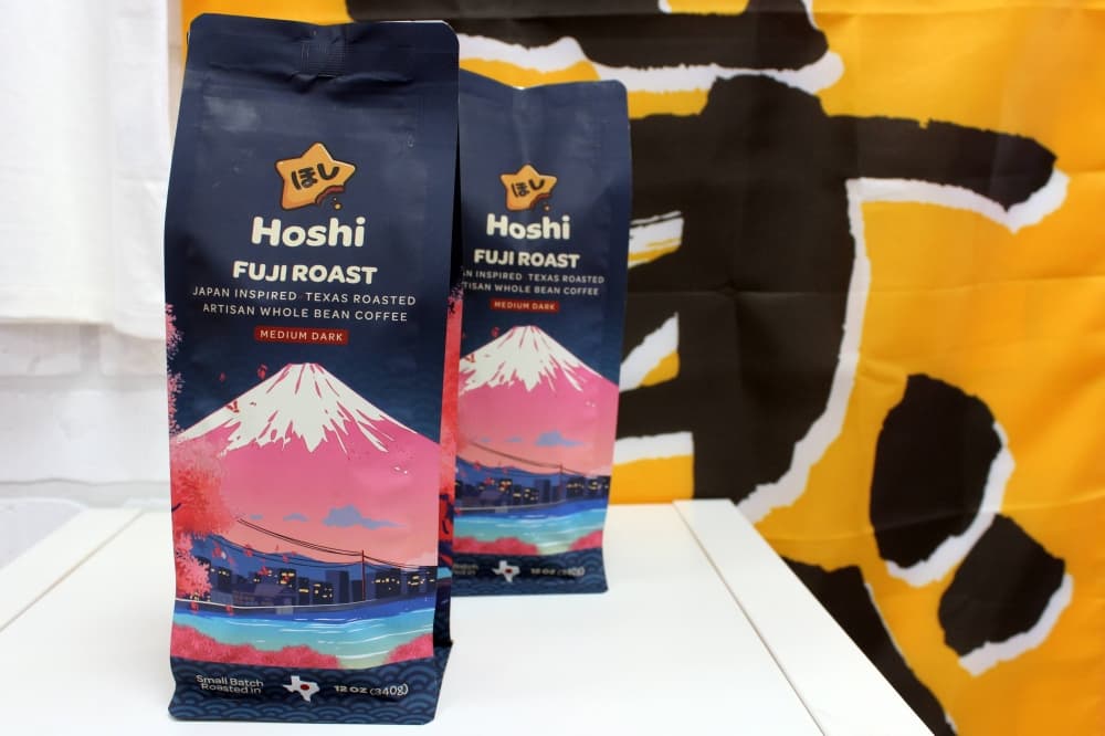 Two bags of coffee featuring Hoshi Fuji Roast branding. 