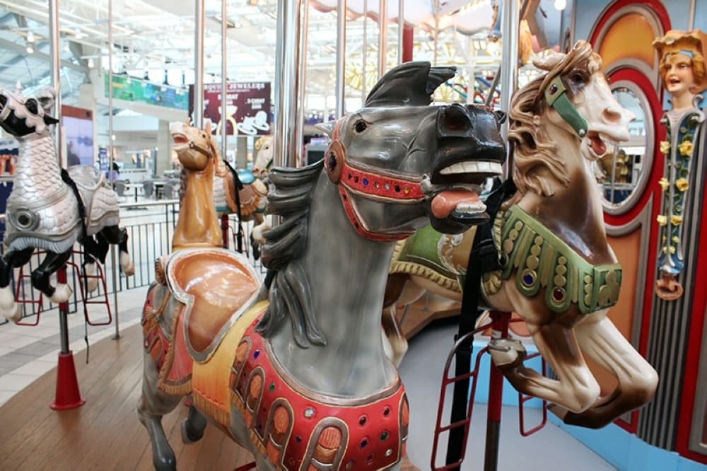 Close up photo of a carousel horse. 