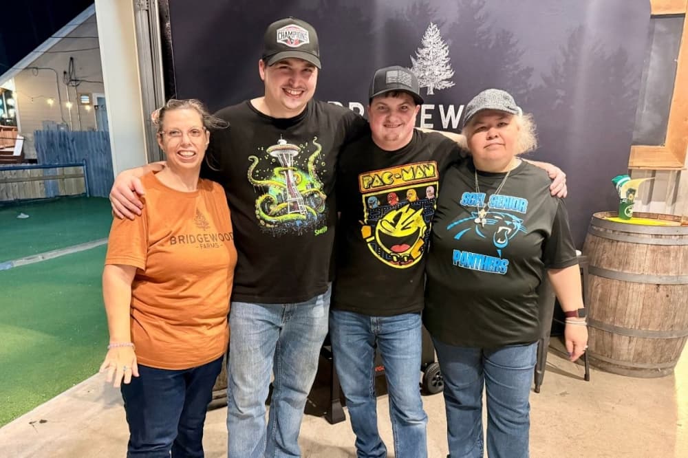 Some Bridgewood Farms residents pose during a night of socializing. (Courtesy Randy Doleman)