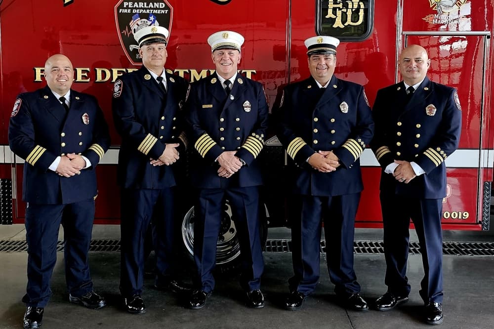 Chief Taylor poses with PFD's command staff in front of a PFD Ambulance. From left, command staff included Division Chief of Training Shane Bridges, Assistant Chief of Operations Curtis Birt, Chief J. Taylor, Assistant Chief of Administration Jacob Johnson and Division Chief of EMS Kelly Sears. (Courtesy Jack "J." Taylor)