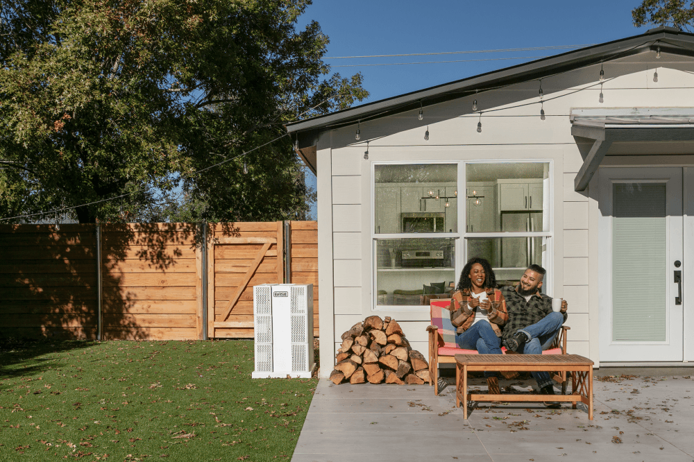 Base Power Company customers sitting on porch