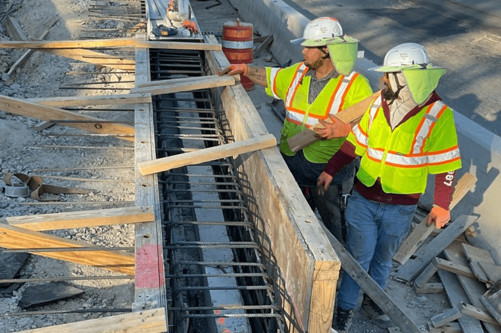 Construction employees working on site