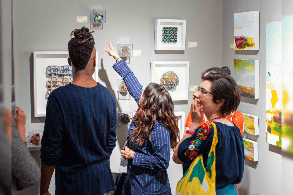 The Superfair attendees looking at art