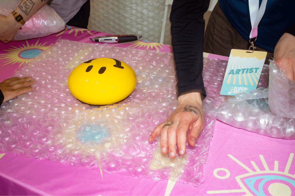 The Superfair smiley face artwork