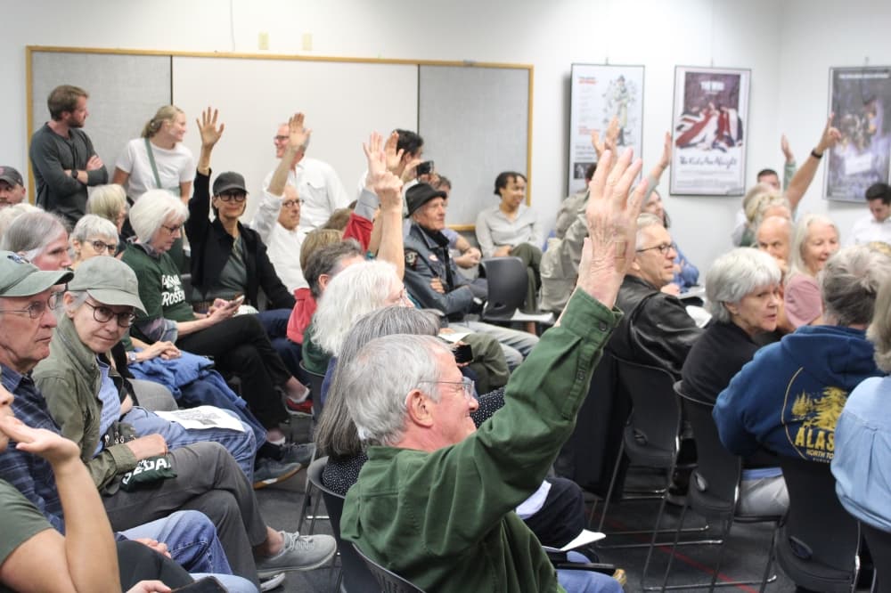 Neighbors who have been sued raise their hands