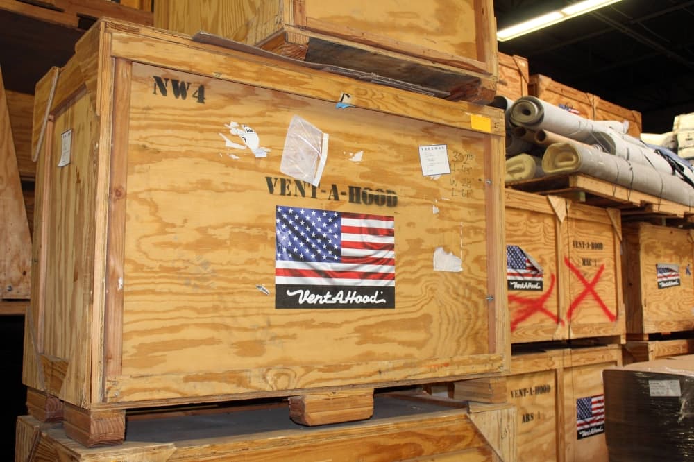 Vent-A-Hood products are shipped in crates featuring the United States flag. (Karen Chaney/Community Impact)
