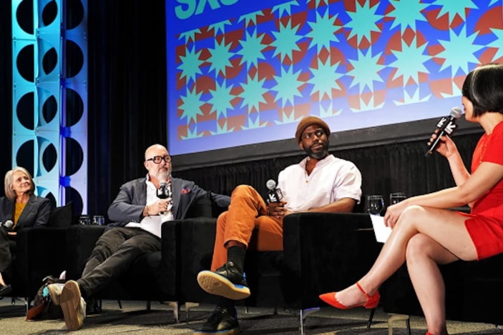An image of a panel of speakers. 