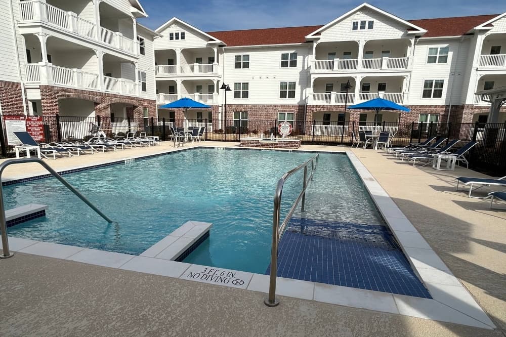 Swimming pool with a walk-in ramp. 