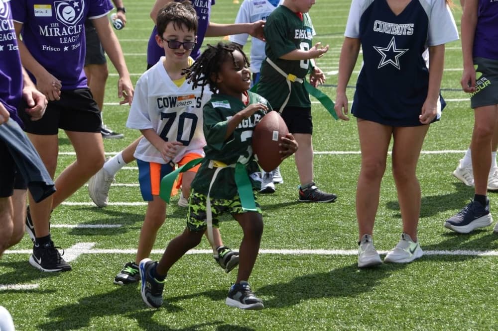 Boys playing flag football. 