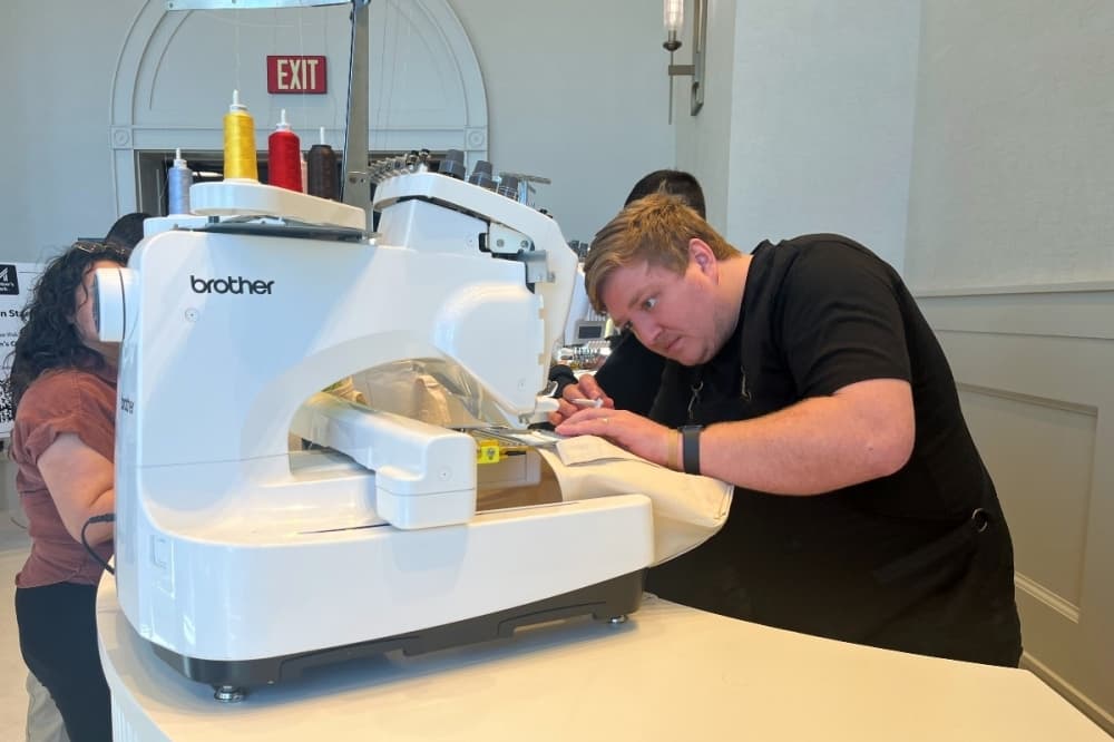 employee working on a bag design