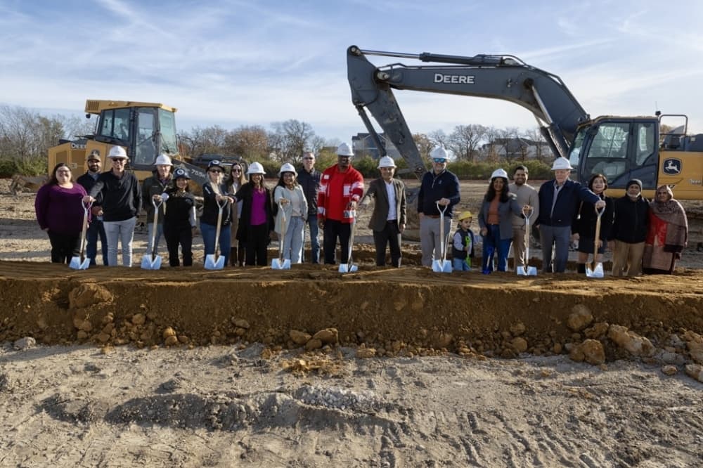 Denton Mayor Gerard Hudspeth (center) was on hand for Urban Air's Denton groundbreaking. (Courtesy Dev Ray)