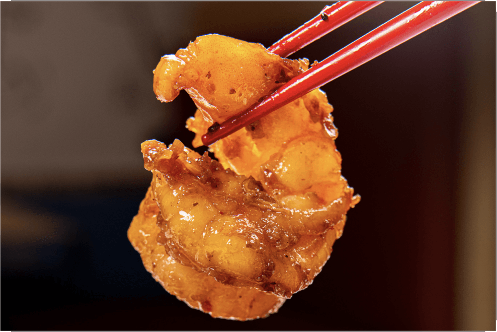 The menu features various entrees, rice dishes and wok-seared bowls. (Courtesy iWok)