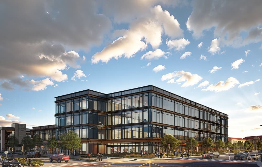 A rendering of an office building made of metal and glass