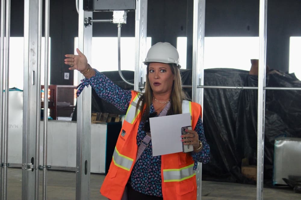 Courtney Goff, communications manager for Avelo Airlines, speaks during a Feb. 26 tour of the McKinney National Airport's future commercial service terminal.
