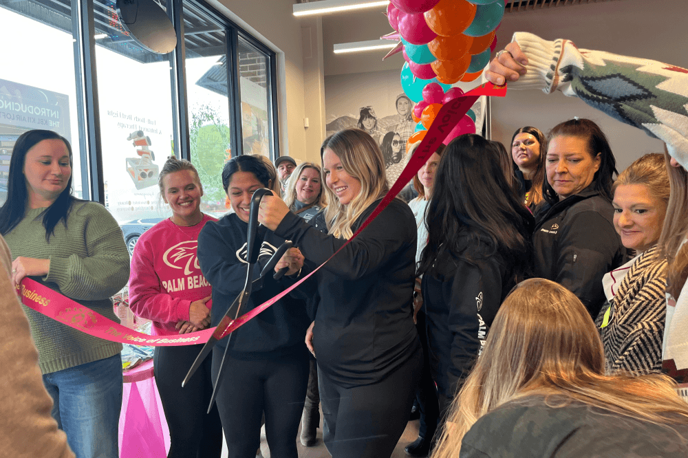 Palm Beach Tan Bastrop ribbon cutting