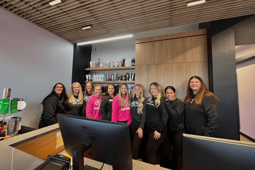 Palm Beach Tan Bastrop team members smiling