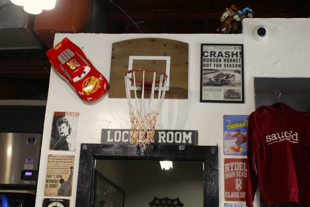 The restaurant is decorated with movie references because co-owners Connor and Cale Gildenblatt  enjoy sports movies. (Heather McCullough/Community Impact) 