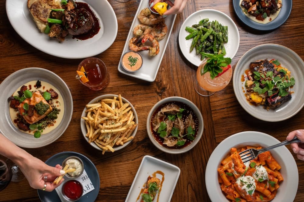 Overview of a variety of dishes of food and drinks. 